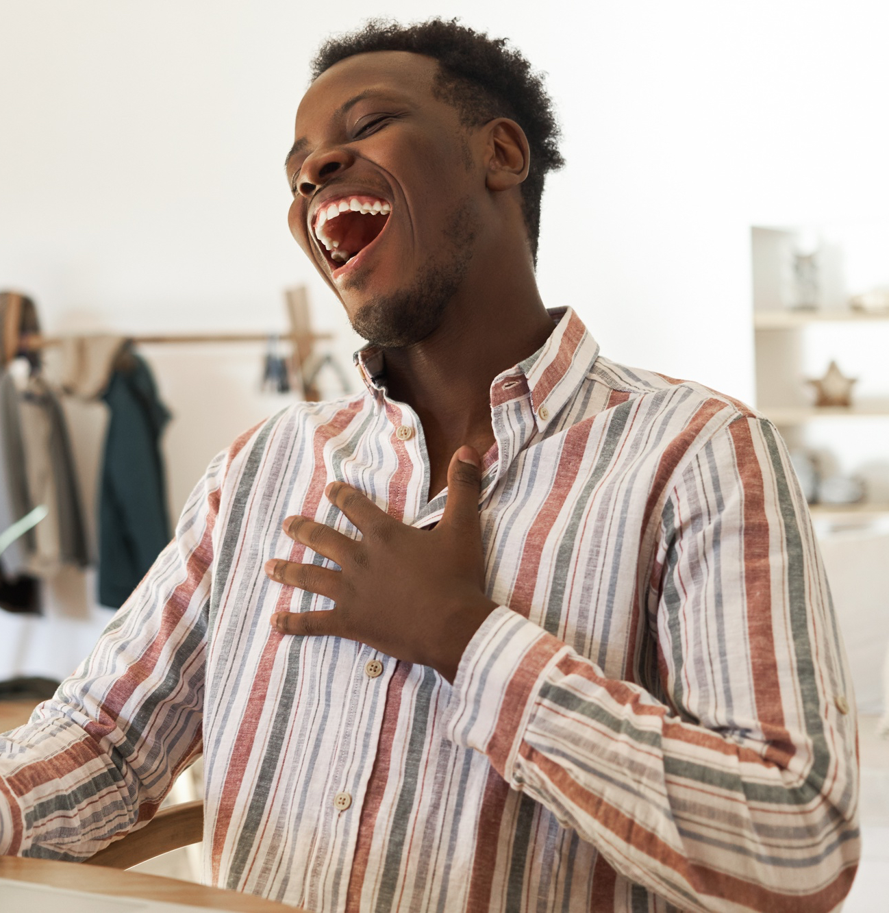 Happy professional working on laptop